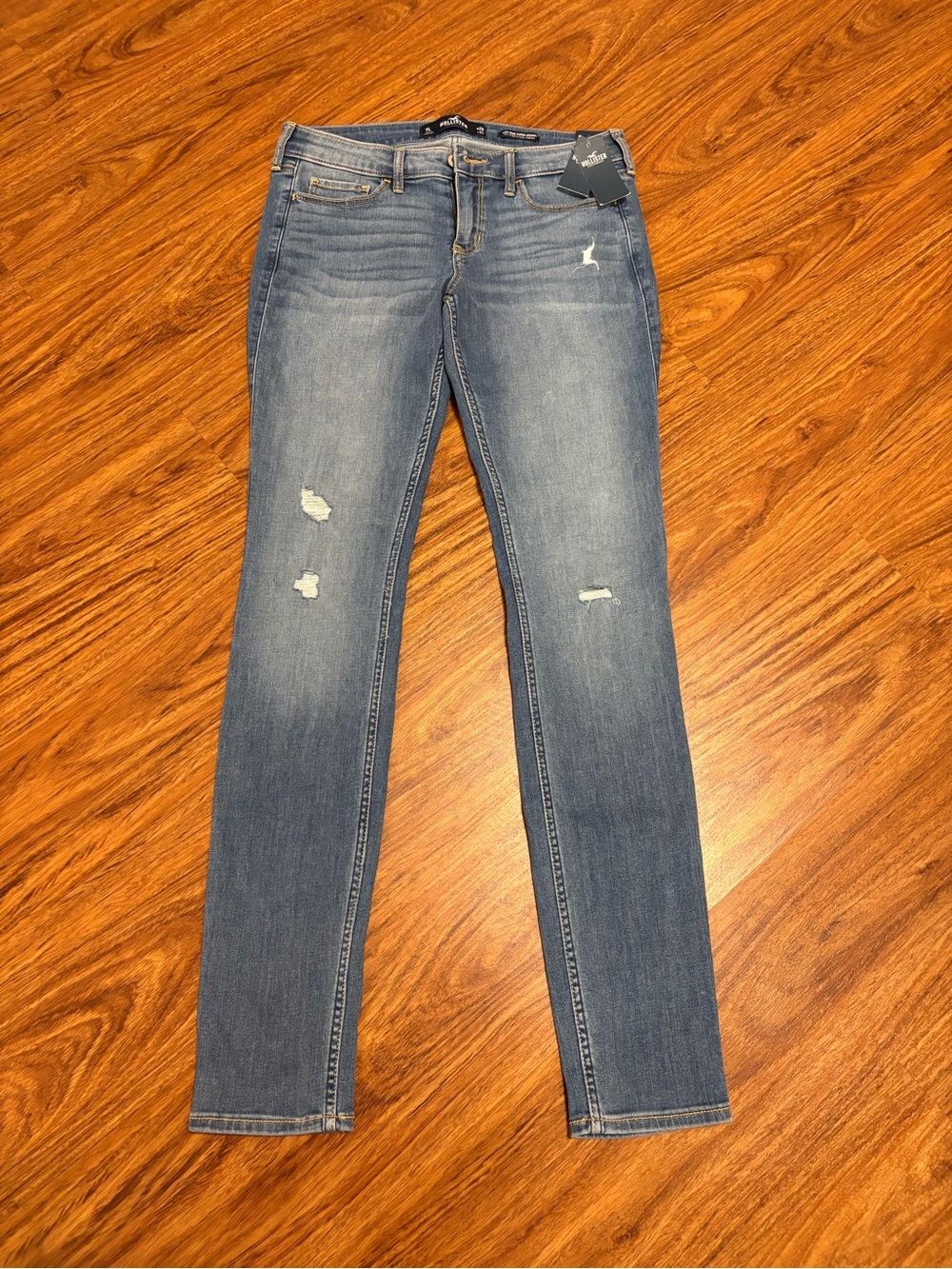 Hollister Women's Low-rise Super Skinny Jeans - Medium Blue Distressed - 7L